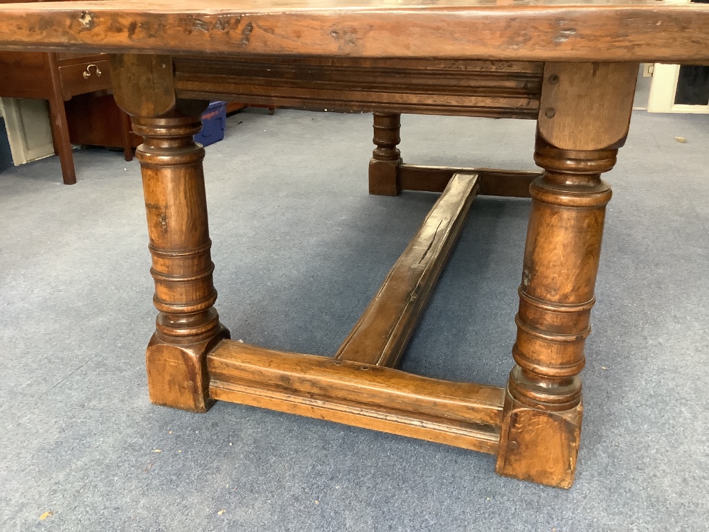 An 18th century style rectangular oak refectory dining table, length 221cm, depth 96cm, height 76cm